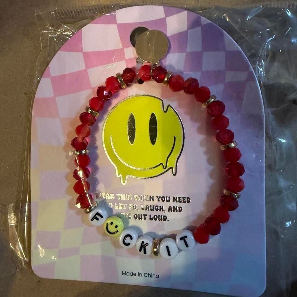 Red beaded bracelet with silver